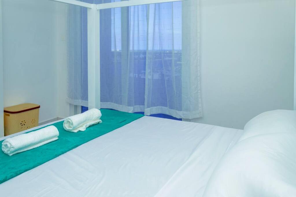 Angani Apartment, Ac Installed, Ocean View & Rooftop Pool Момбаса Екстер'єр фото