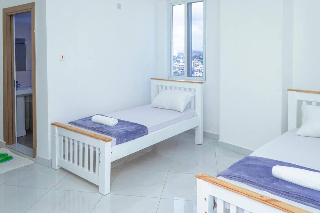 Angani Apartment, Ac Installed, Ocean View & Rooftop Pool Момбаса Екстер'єр фото