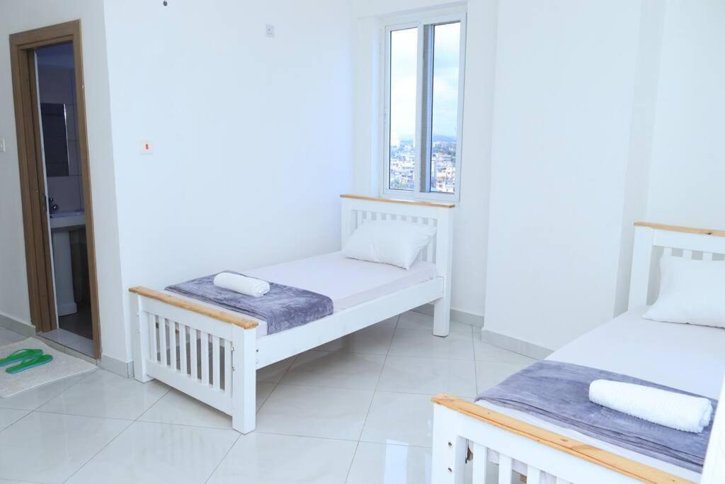 Angani Apartment, Ac Installed, Ocean View & Rooftop Pool Момбаса Екстер'єр фото