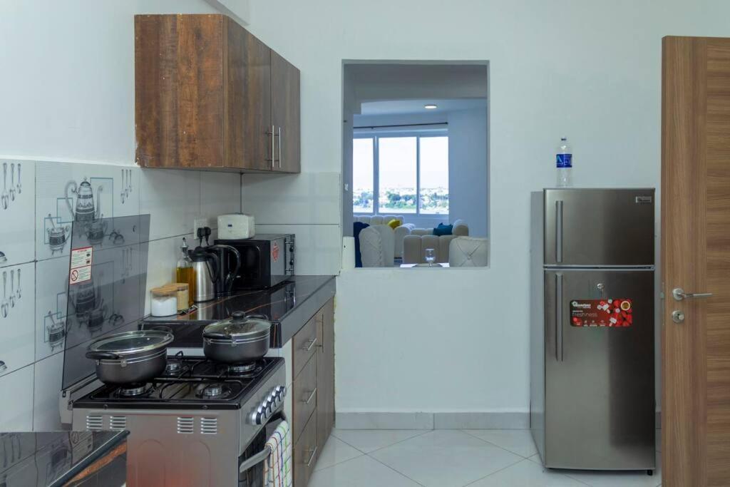 Angani Apartment, Ac Installed, Ocean View & Rooftop Pool Момбаса Екстер'єр фото