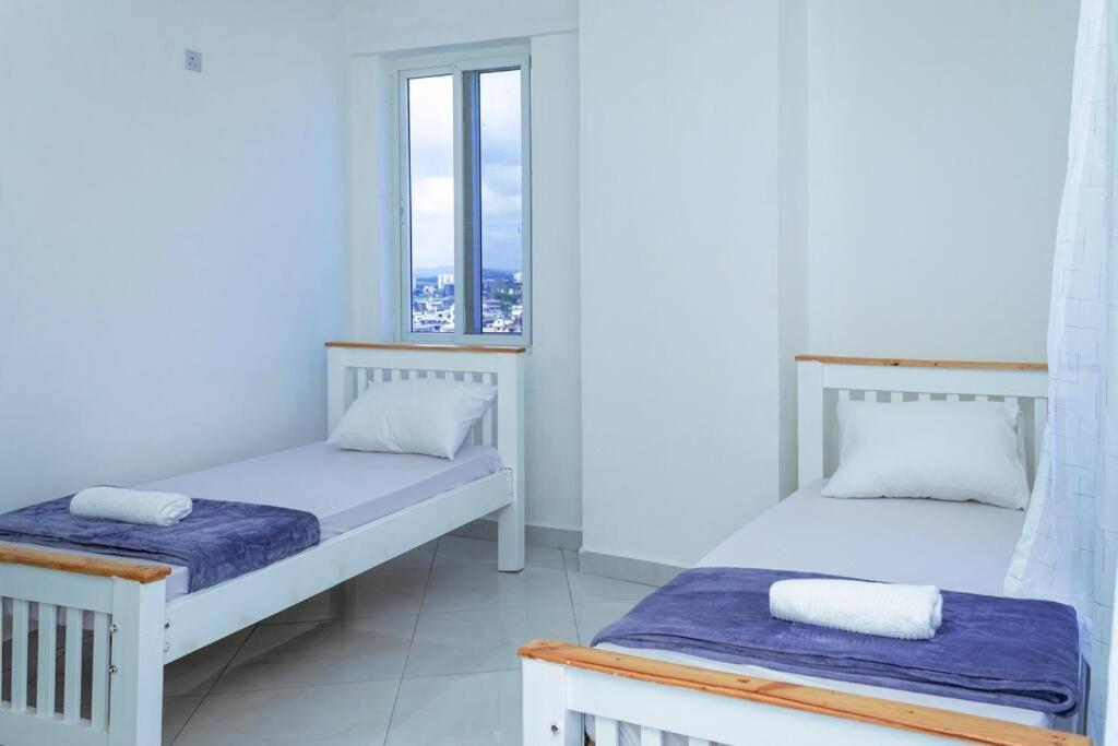 Angani Apartment, Ac Installed, Ocean View & Rooftop Pool Момбаса Екстер'єр фото