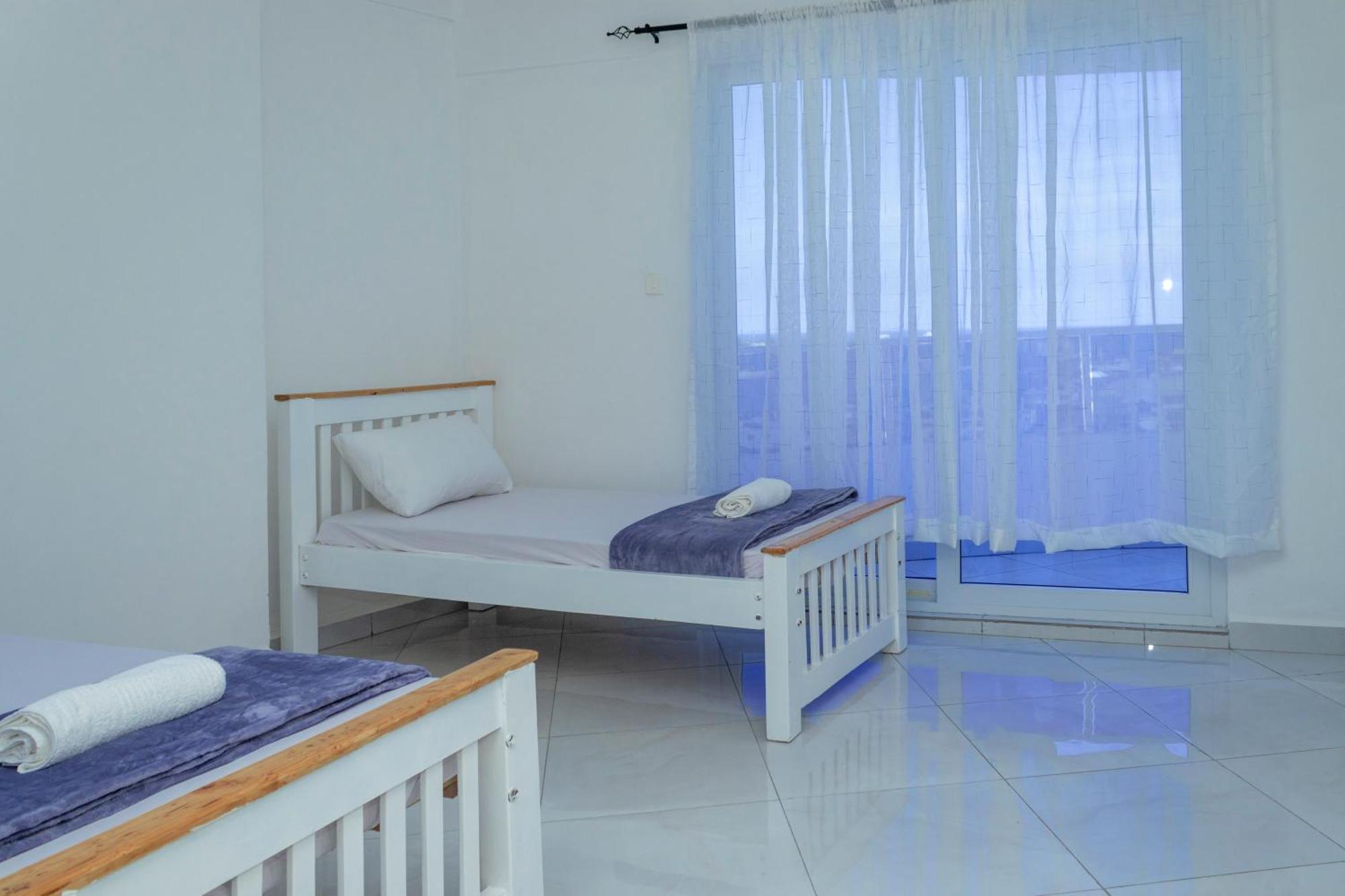 Angani Apartment, Ac Installed, Ocean View & Rooftop Pool Момбаса Екстер'єр фото