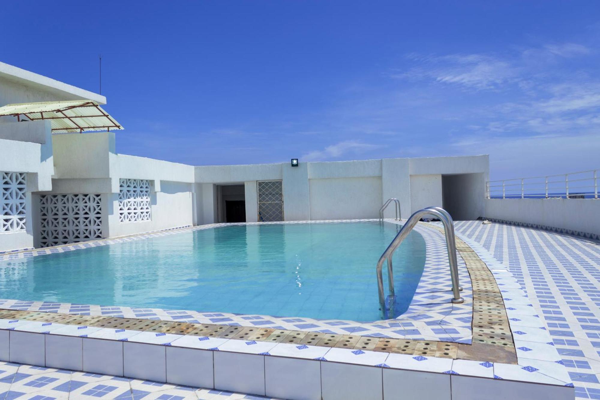 Angani Apartment, Ac Installed, Ocean View & Rooftop Pool Момбаса Екстер'єр фото